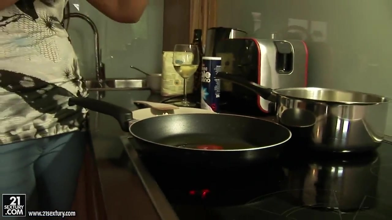 Aletta Ocean cooking and demonstrating her boobs