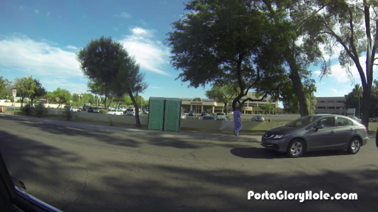 Porta Gloryhole Redhead sucking cock in public