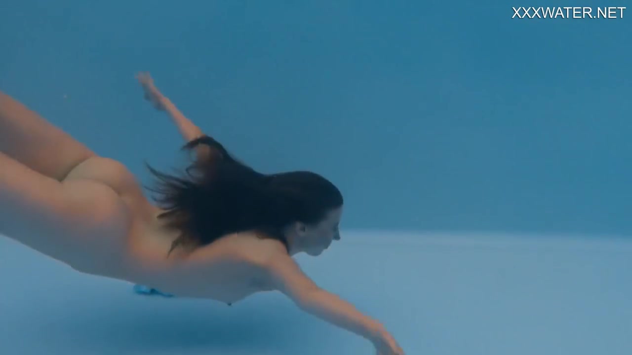 Petite Russian Marfa Swims Nude In The Pool