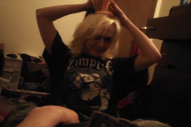 Kinky emo girlfriend fooling around with a strapon