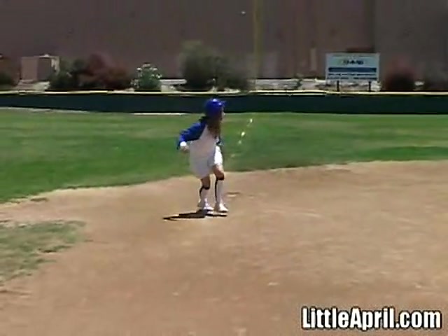 Little April Plays With Herself After A Game Of Baseball