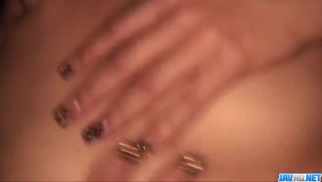 Busty Maria Ozawa likes to pose when playing with toys