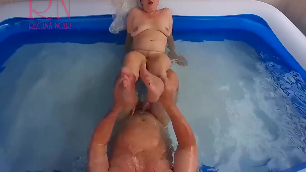 Outdoor Pussy Show. Nude Couple Plays In The Outdoor Nudist Swimming Pool With Regina Noir