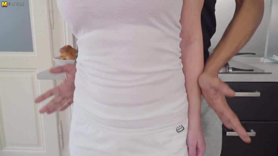 Big dicked black guy fucking a MILF in her kitchen