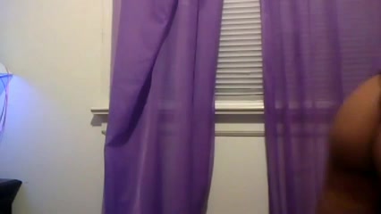 Curvy Ebony gal stripping for an erotic webcam show