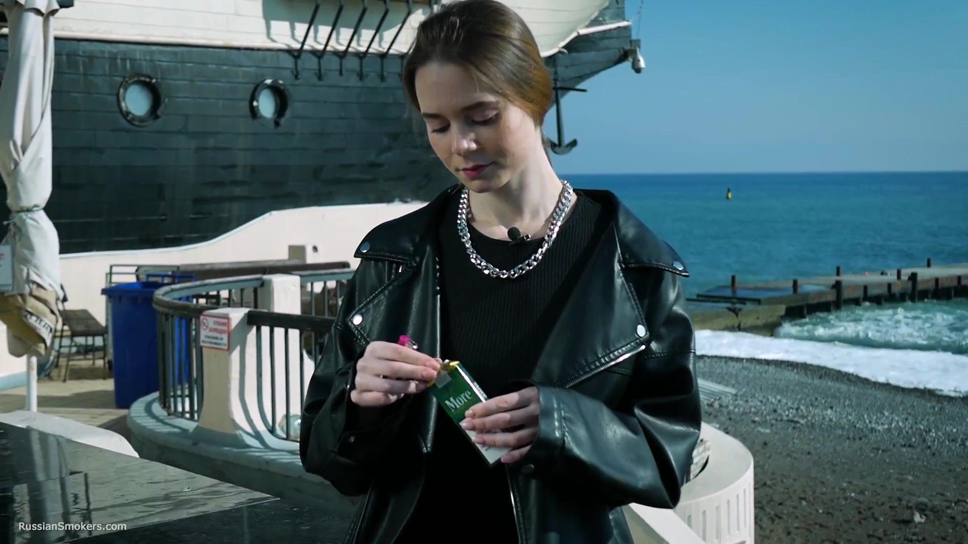 Smoking Strong Brown 120mm Cigarette Near The Beach