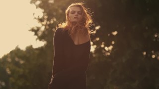 Redhead girl making striptease on the autumn meadow - 4K - XCZECH.com