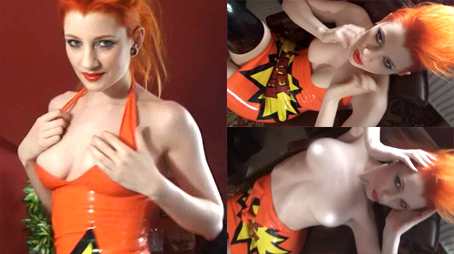 Ulorin Vex in Orange Dress and Stockings - LatexHeavenVideo