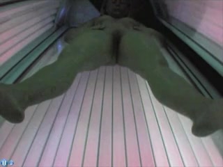 solarium, boob show