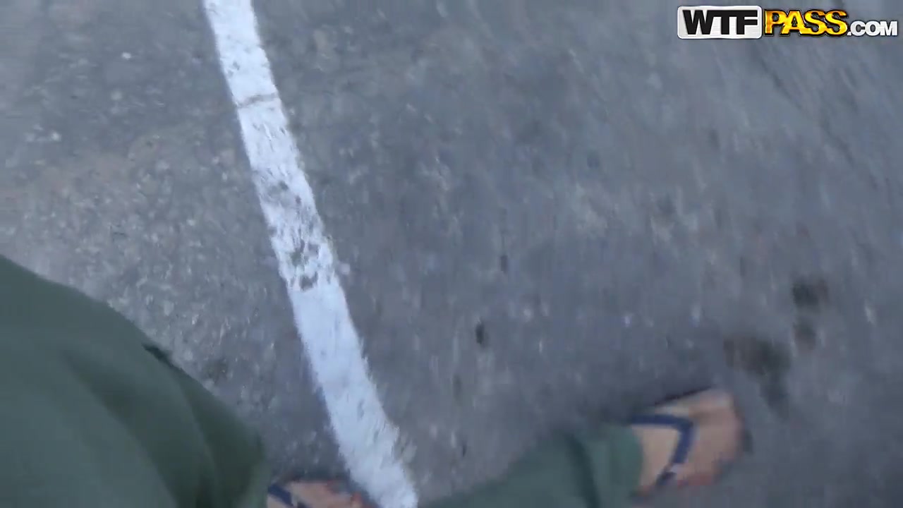 Cutie kneels and plays with two big stiff dicks