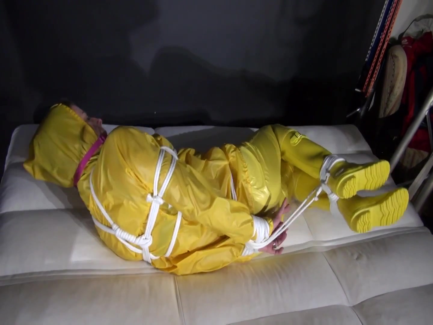 Watch Pia Enjoying Bondage In Her Shiny Nylon Yellow Rainwear