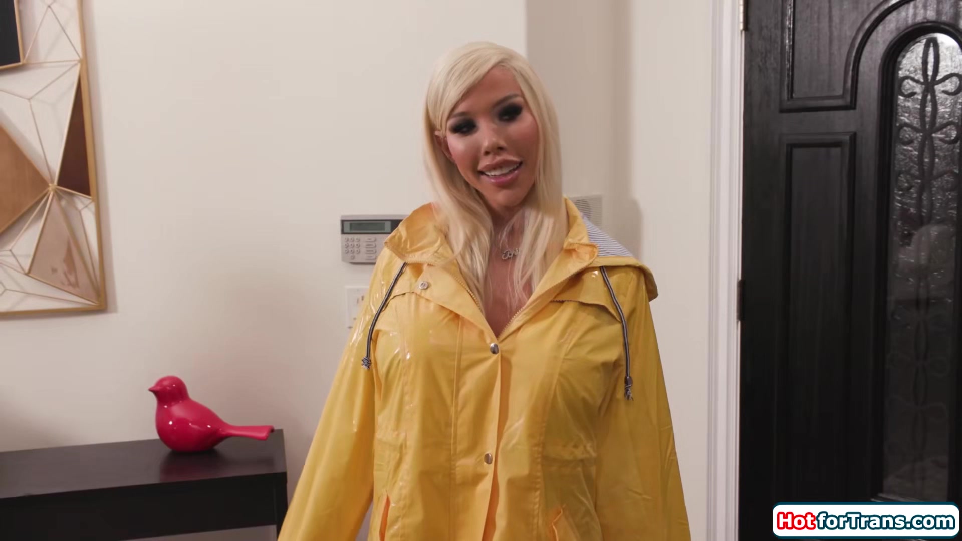 What are you hiding underneath your raincoat Brittney Kade?