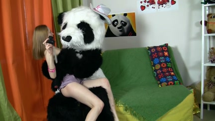 sucks teddy bear with a pink fake penis