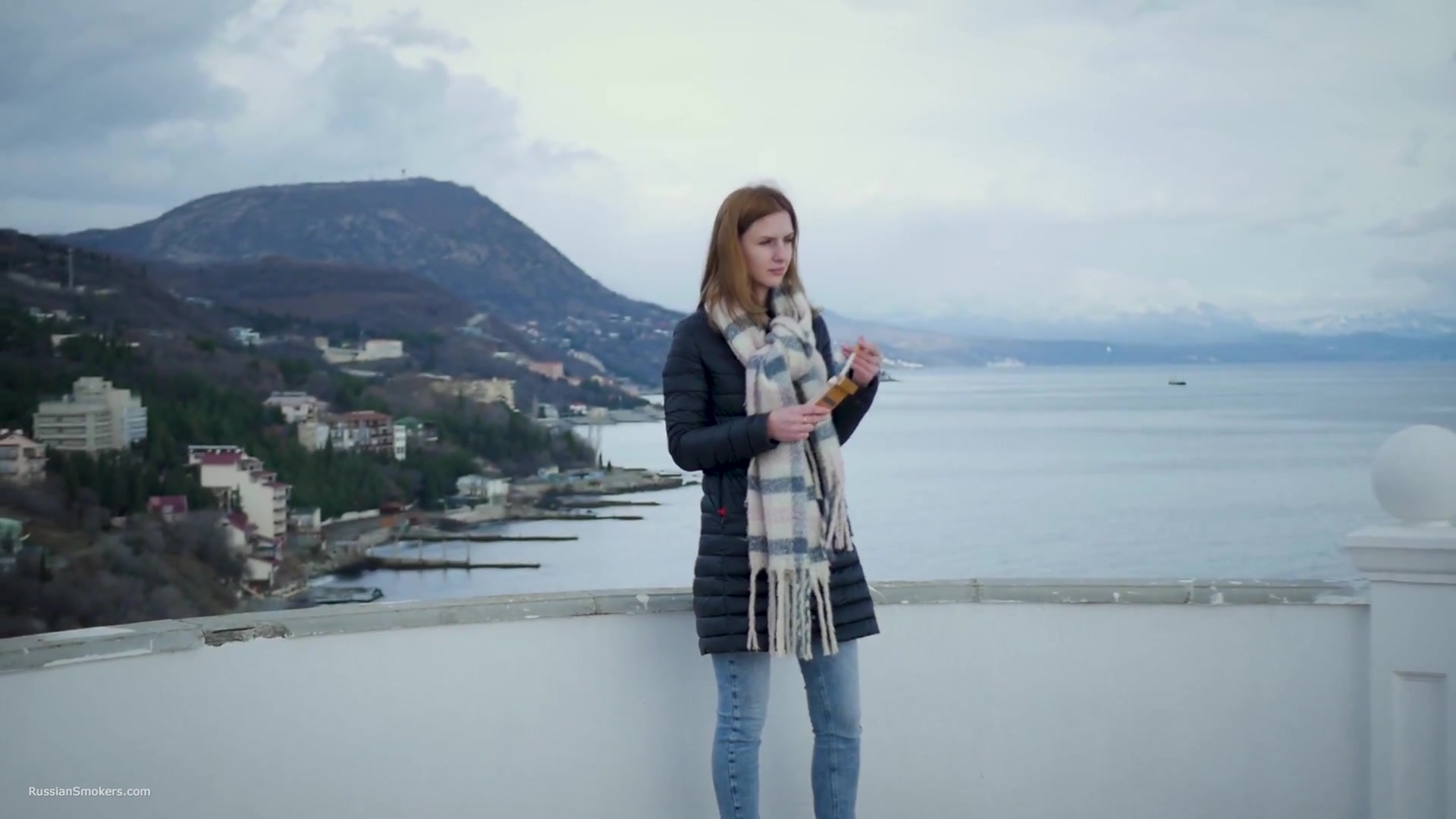 Beautiful Lady Is Smoking Two Saratoga Cigarettes In A Row On A Beautiful View
