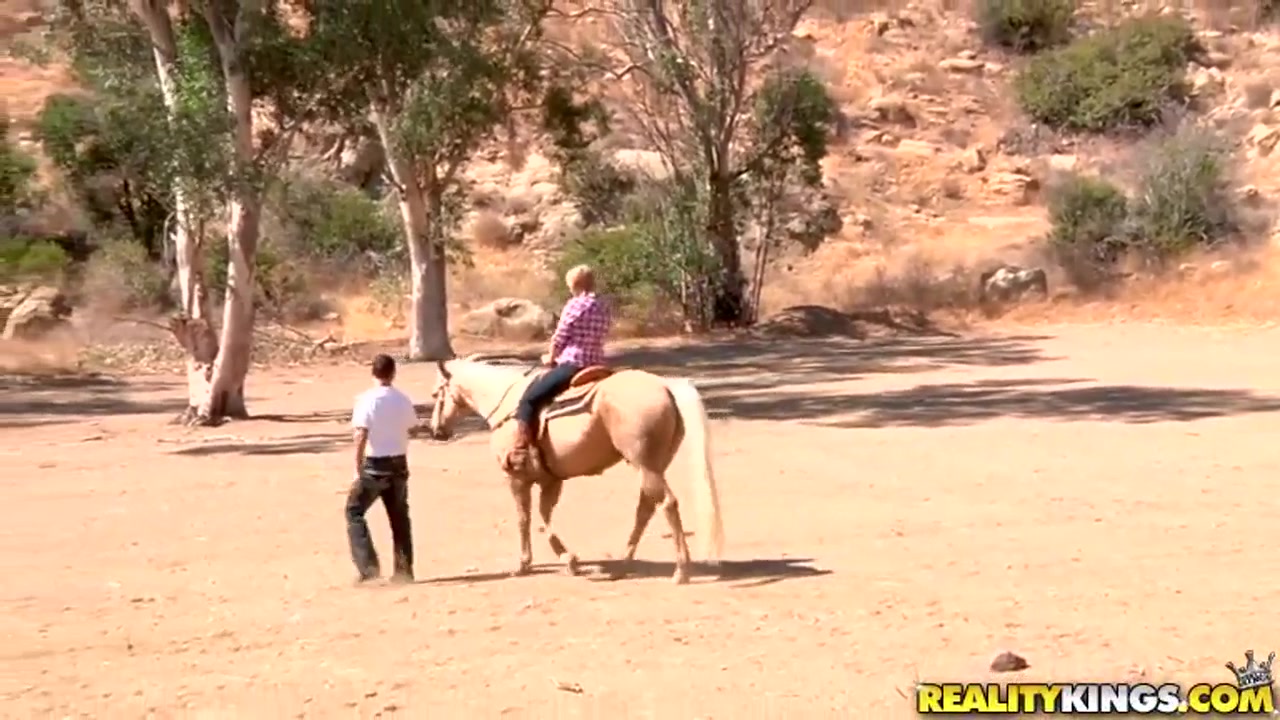 Ridiculously busty Sierra Skye rides the horse
