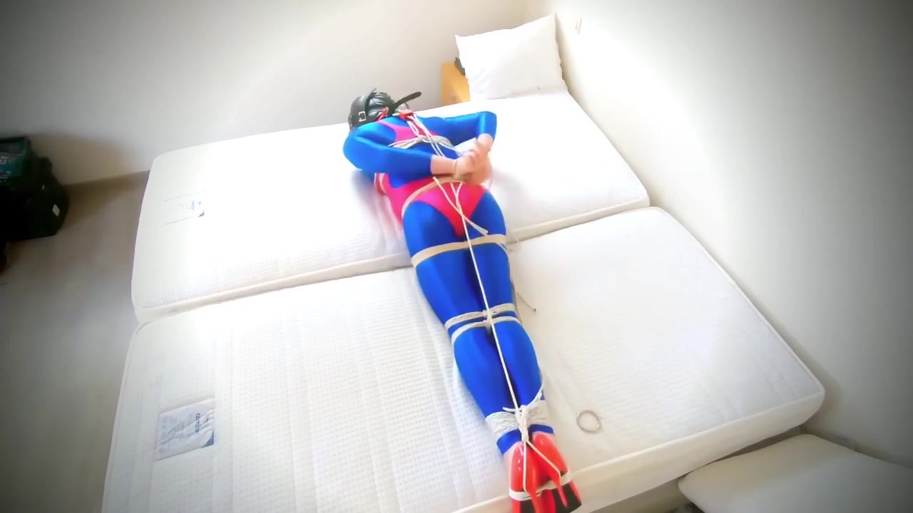 Selfbondage In Leohex Swimsuit And Shiny Catsuit
