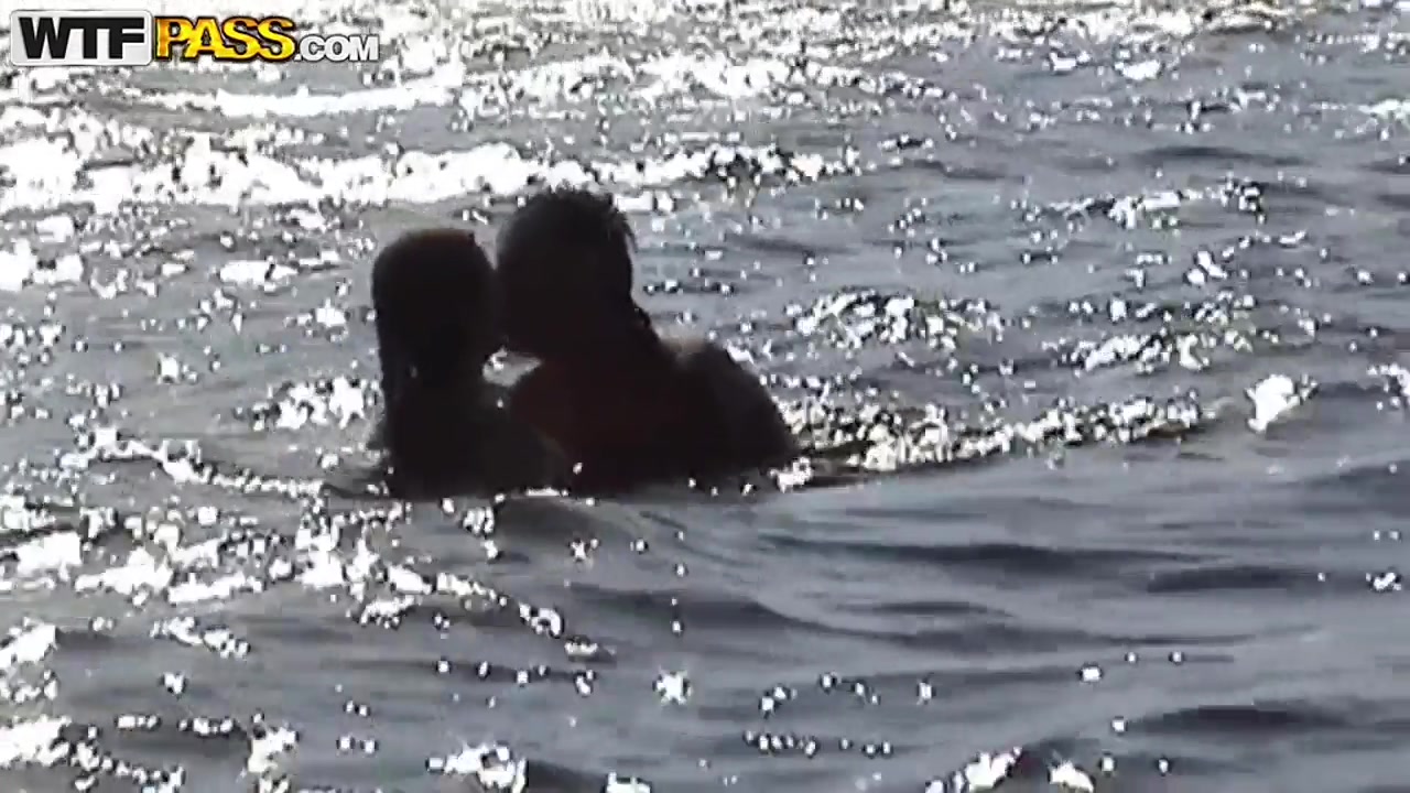 Petite babe Angelina in bikini gives head outdoor