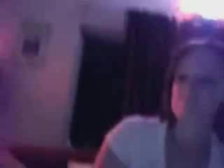 MILF shows a cool tattoo on her boob and shaved pussy