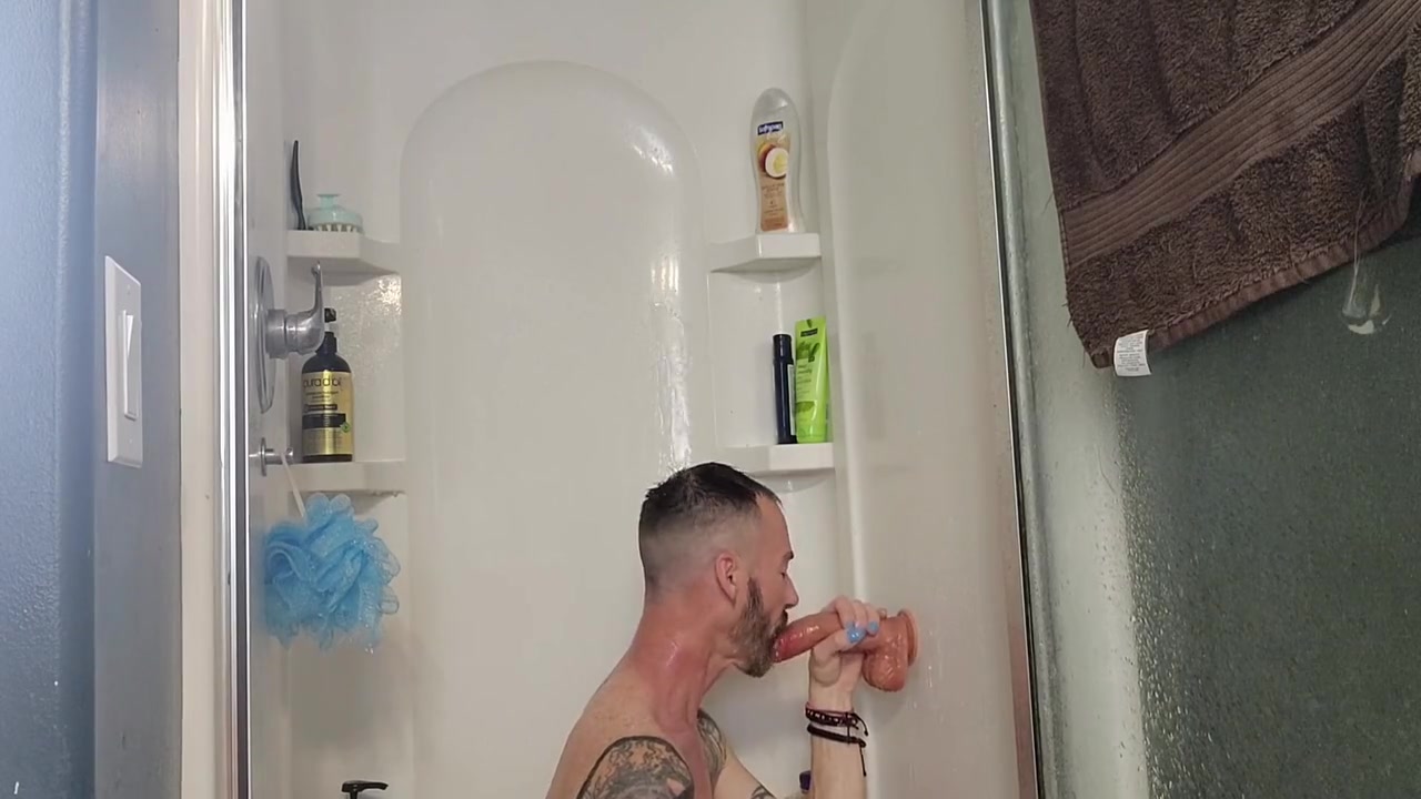 Mikel Donovon Fucks And Sucks His Dildo In The Shower!
