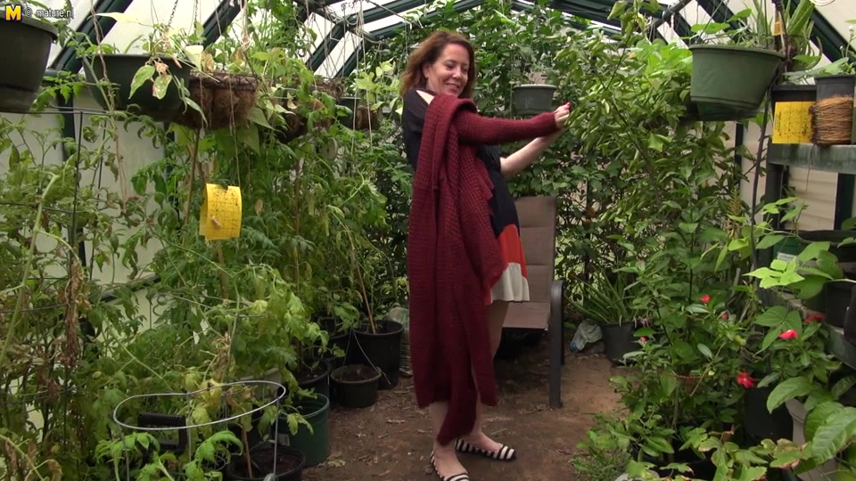 This American Cougar Gets Frisky In Her Gardenhouse - MatureNL