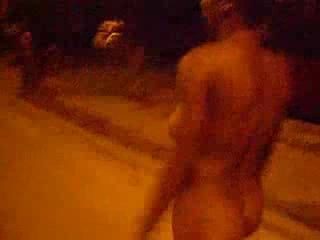 Sexy Ebony want to attract attention of the guys by walking naked
