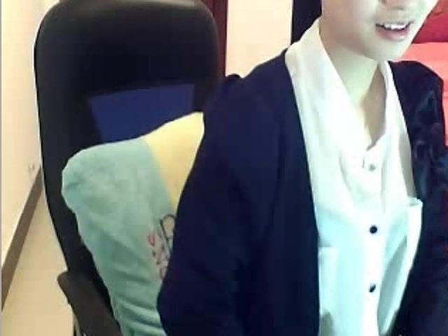 Asian babe stripping her suit in front of the viewers