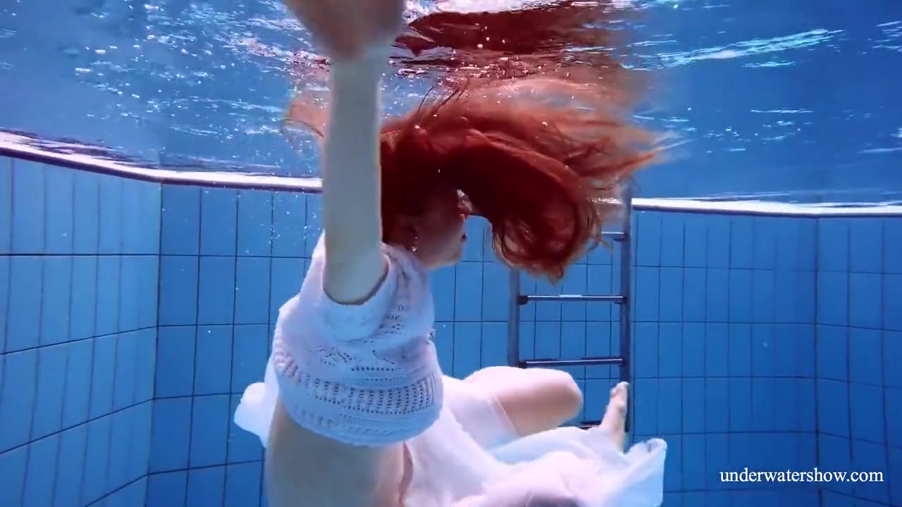 Redhead Marketa In A White Dress In The Pool