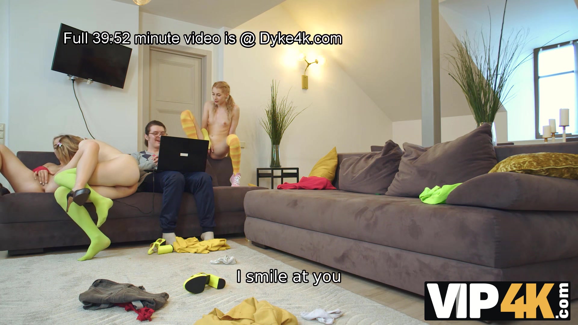 VIP4K. While man talks on a video call three ladies enjoy lesbian 3some