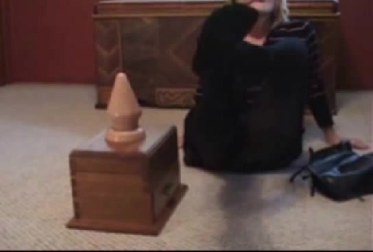 Busty cougar playing with her gaping slit