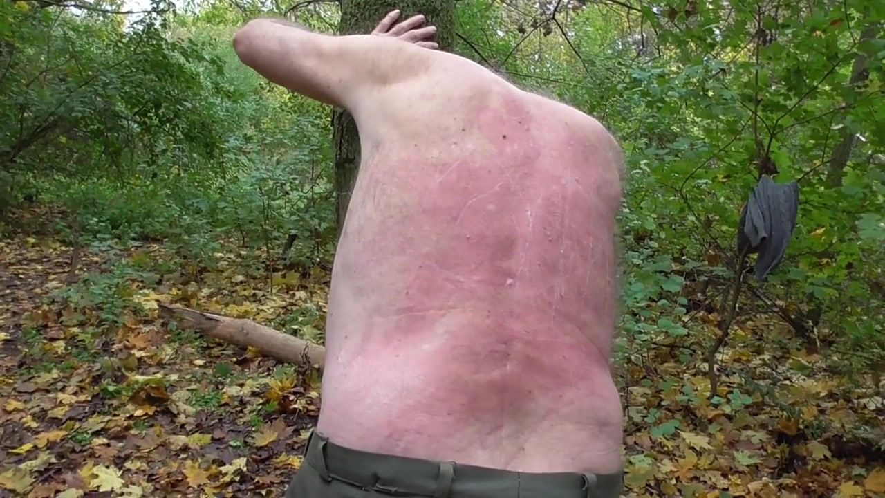 Spank session in the forest, male slave by Femdom Austria