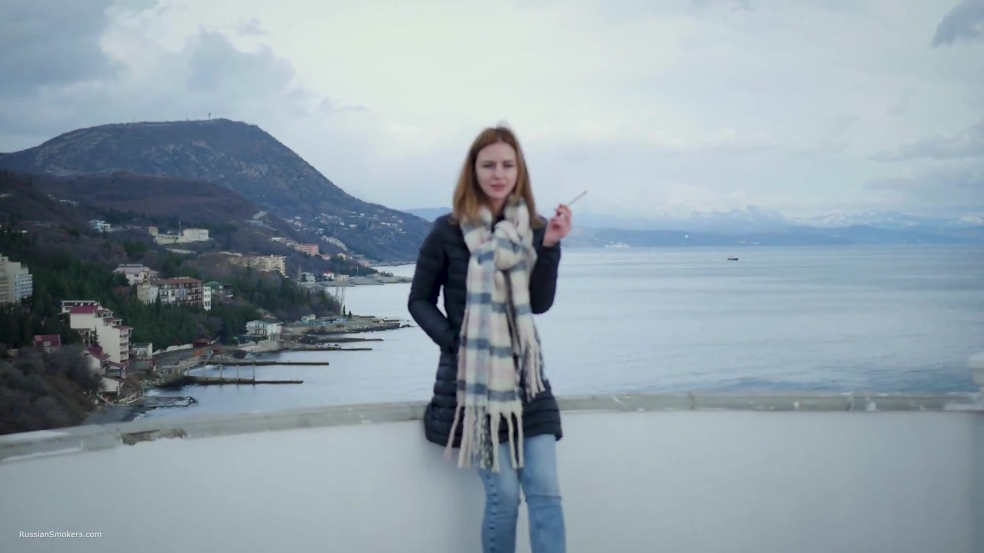 Beautiful Lady Is Smoking Two Saratoga Cigarettes In A Row On A Beautiful View