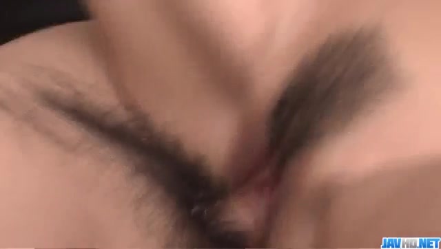 Rika Kurachi maons with a big cock in her tight vag
