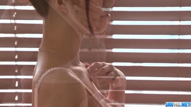 Kotomi plays with glass toy down her hairy pussy