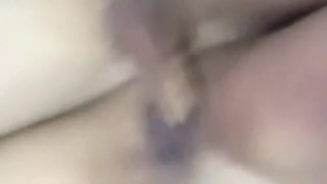 Young Latina spreading her legs and masturbating with a sex toy
