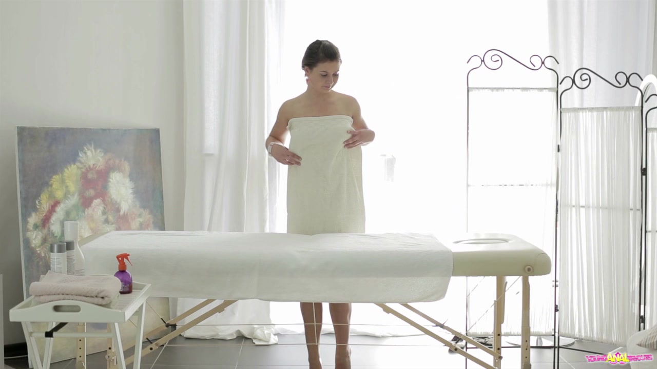 The masseuse gets ready to work on Maia's young body before they try anal