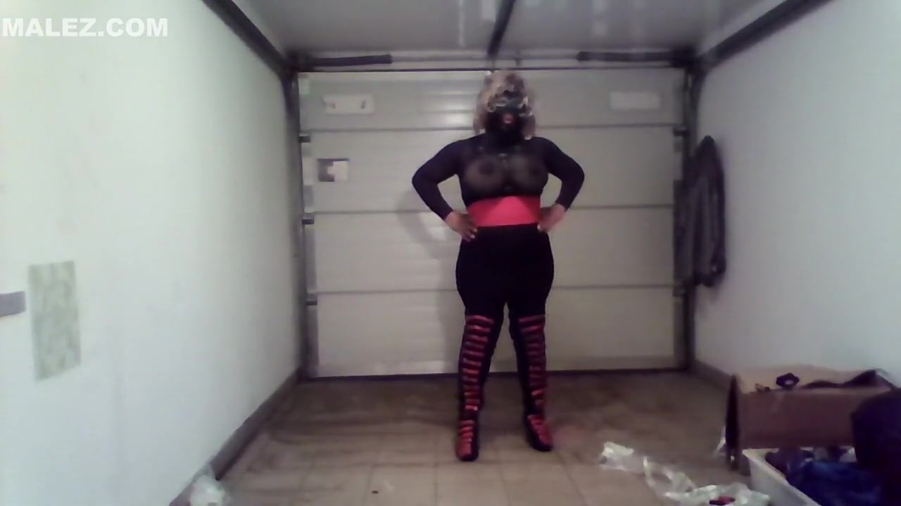 Crossdresser with black and pink boots