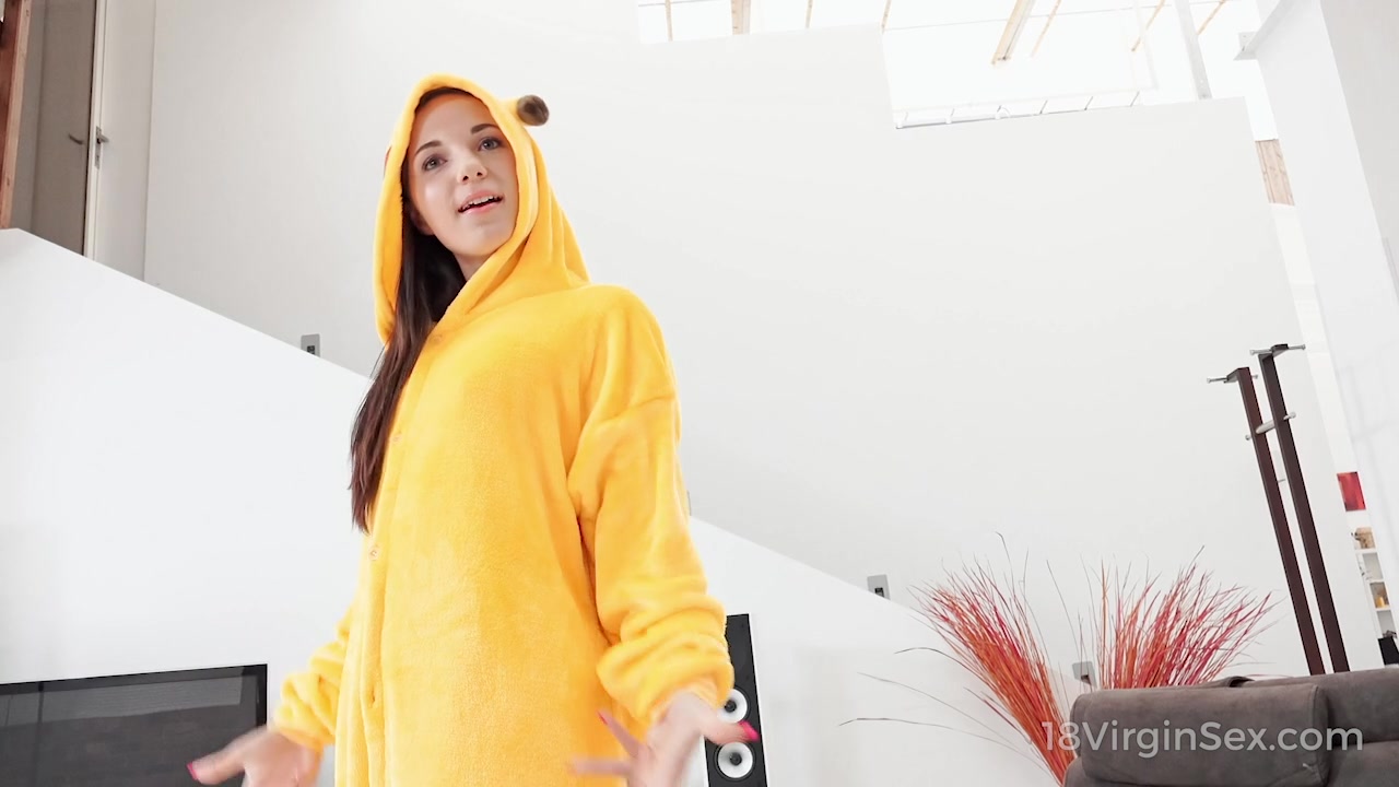 Brunette in Pikachu outfit teases a busy man