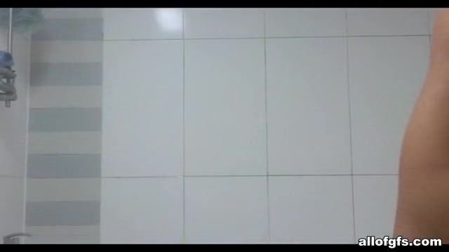 Cute Asian gf in the bathroom having a shower