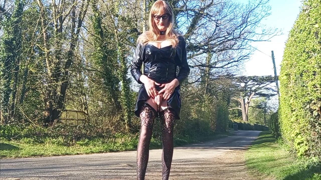 Crossdressing Tranny Outdoors Pissing And Posing
