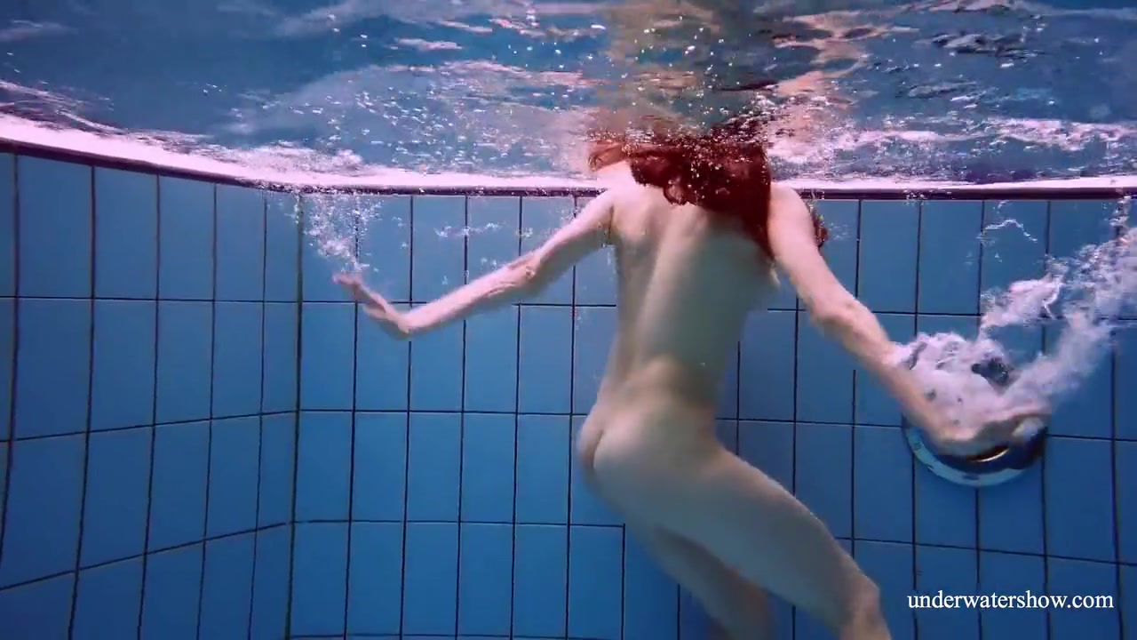Redhead Marketa In A White Dress In The Pool