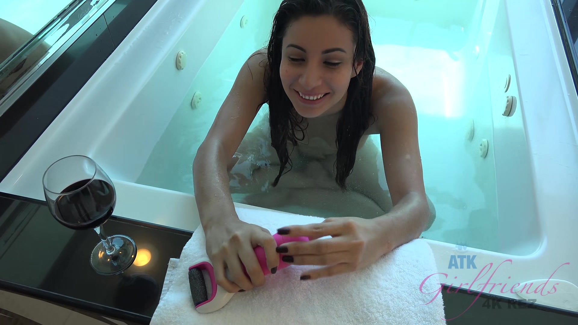 After The Water Drains From The Tub She Pulls The Shower Nozzle Towards Her Pussy To Masturbate