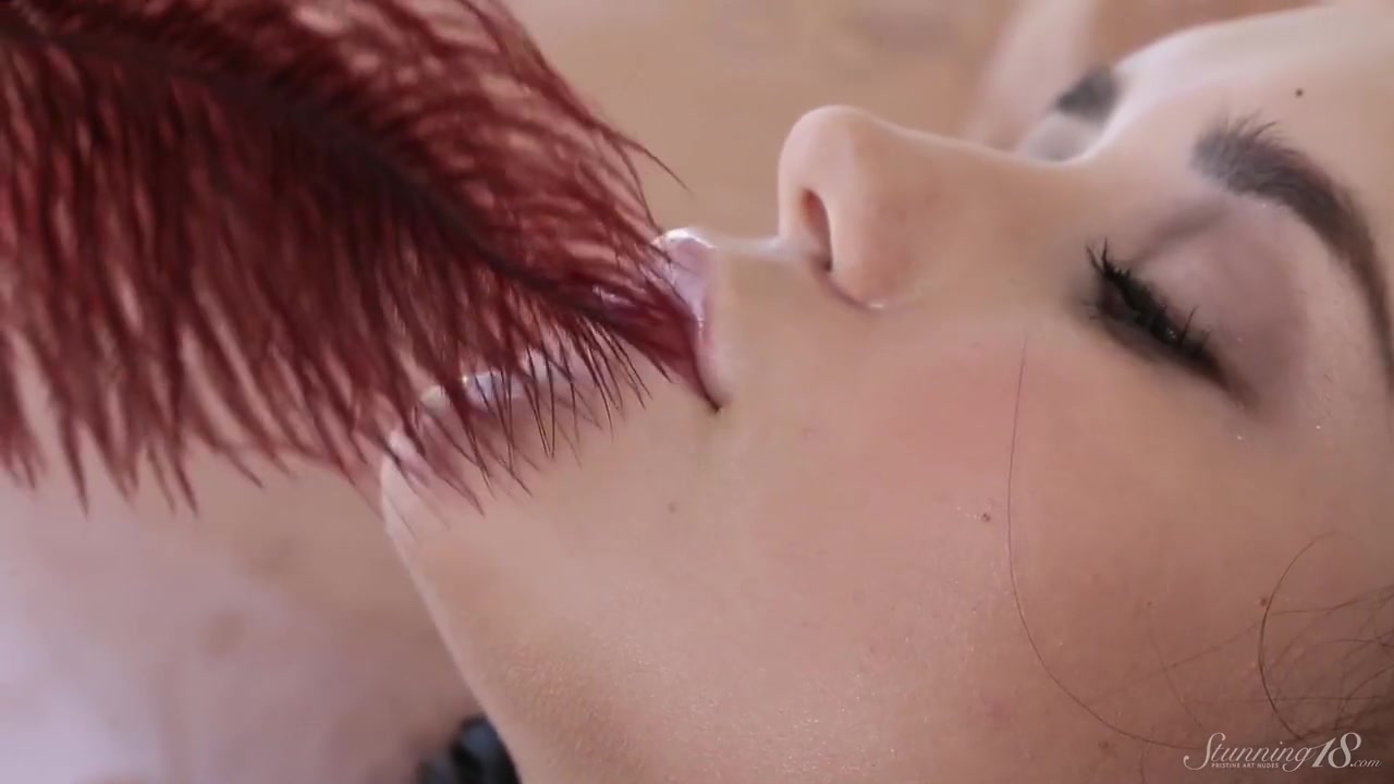 Coed Susan Strokes Her Body And Pussy With Red Feathers!