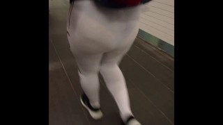 Candid see through white leggings walking through train station