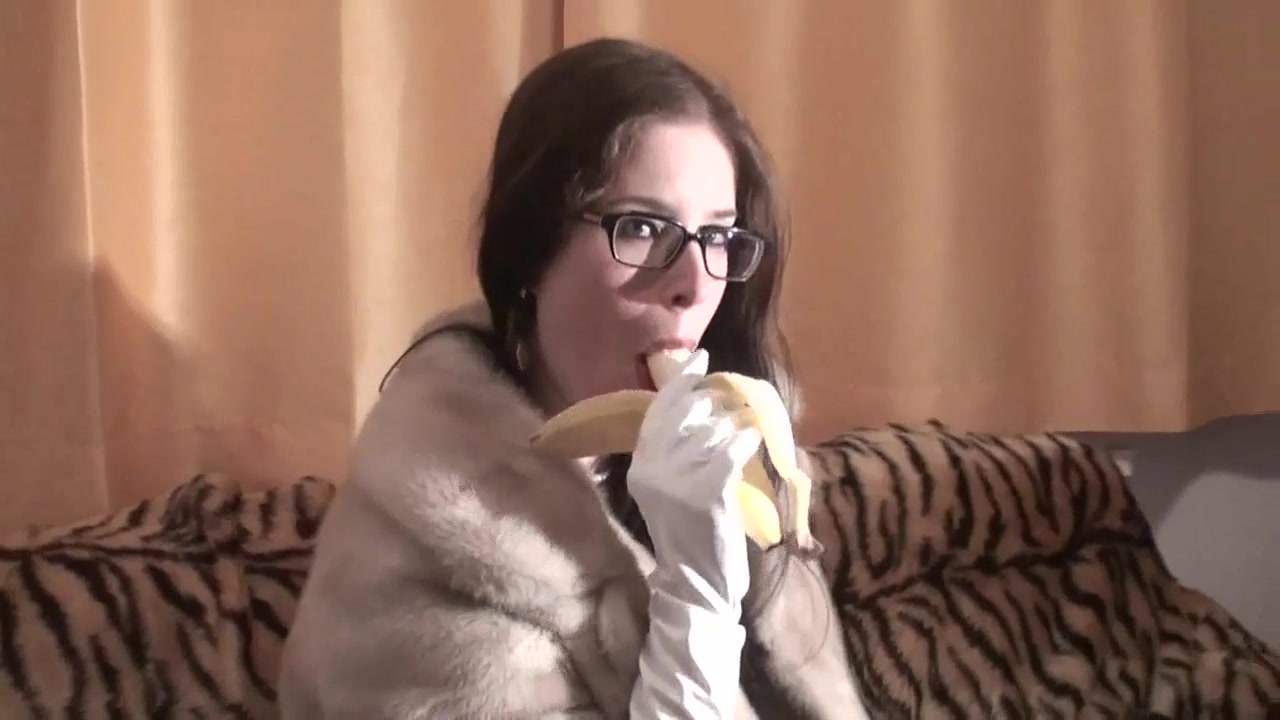 Spex brunette talking dirty while eating banana by Femdom Austria