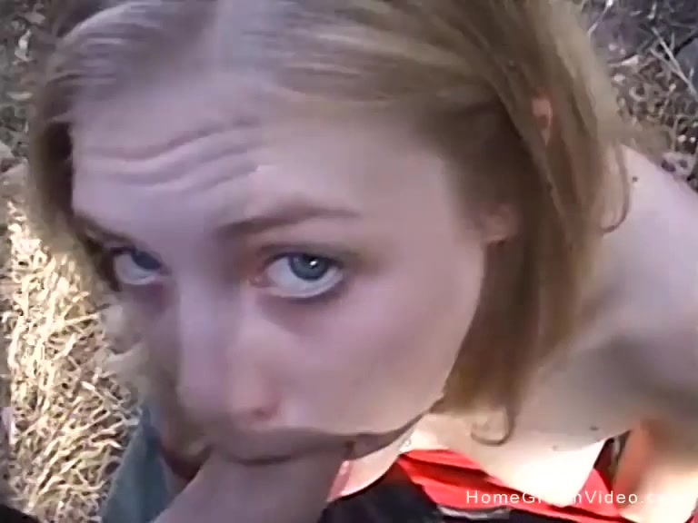 Young blonde amateur sucking a big cock outside