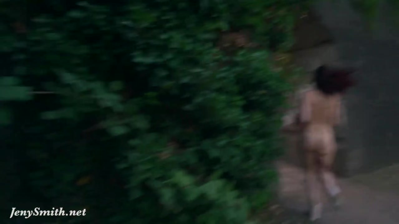 Jeny Smith is walking naked through an abandoned factory.