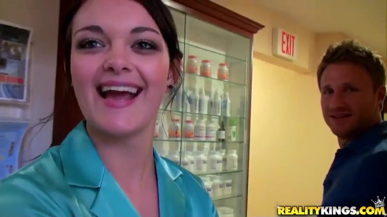 Sexy doctor plays with her handsome patient