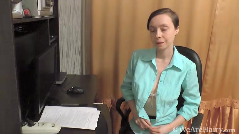 Trixie masturbates by her office desk and orgasms - WeAreHairy