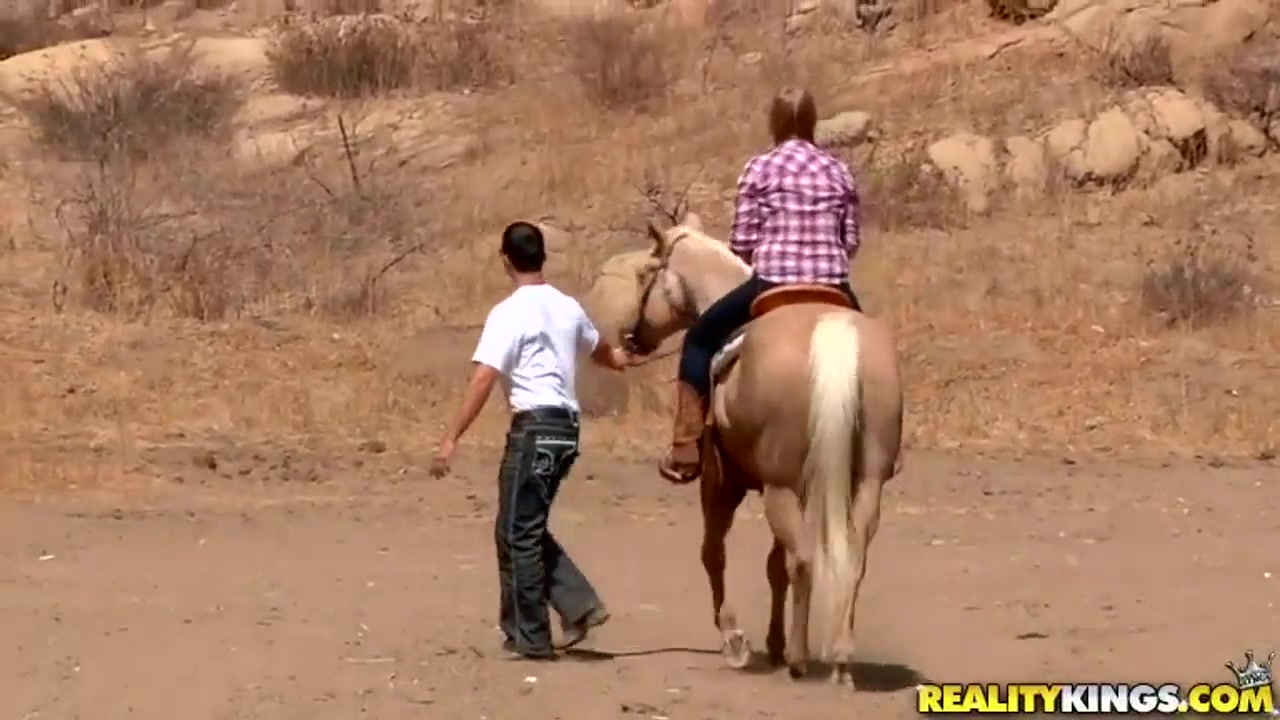 Ridiculously busty Sierra Skye rides the horse