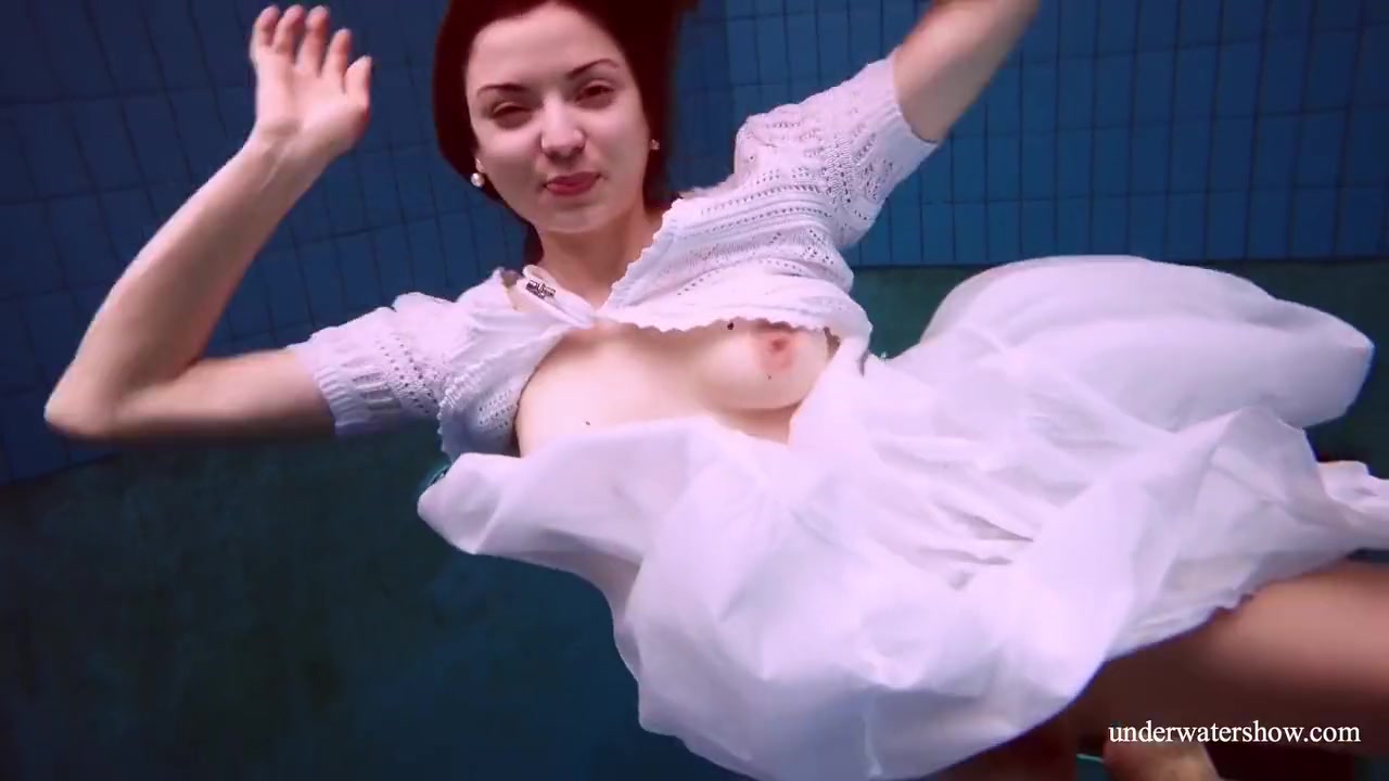 Redhead Marketa In A White Dress In The Pool